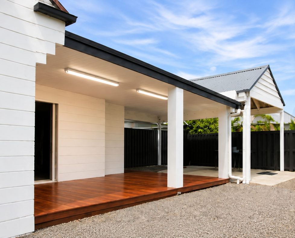 House courtyard after renovation with a new covered timber deck