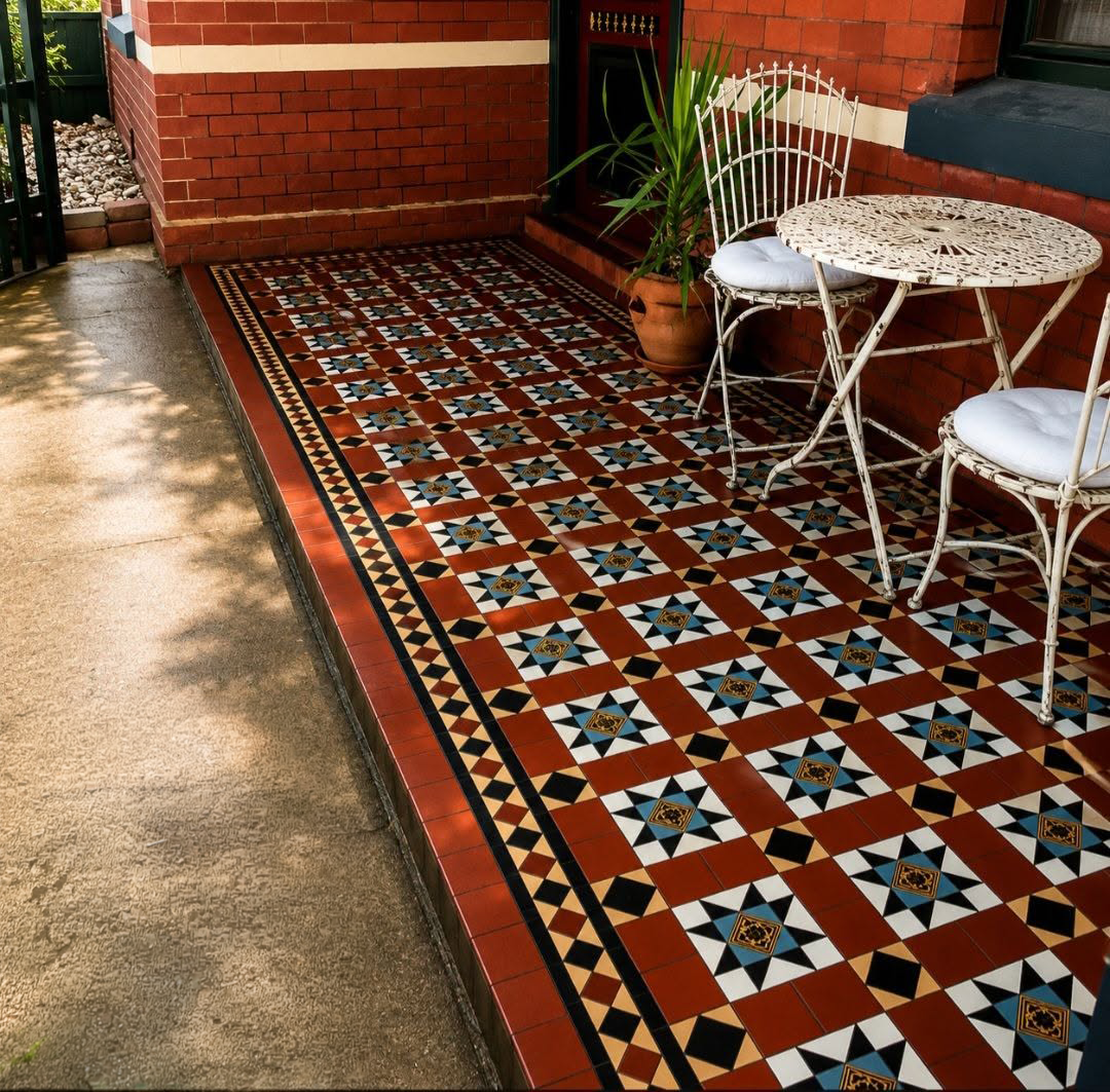 Detailed patterned heritage tiles on a front veranda